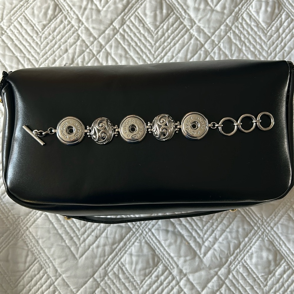 Gingersnap bracelet holds three interchangeable snaps silver tone